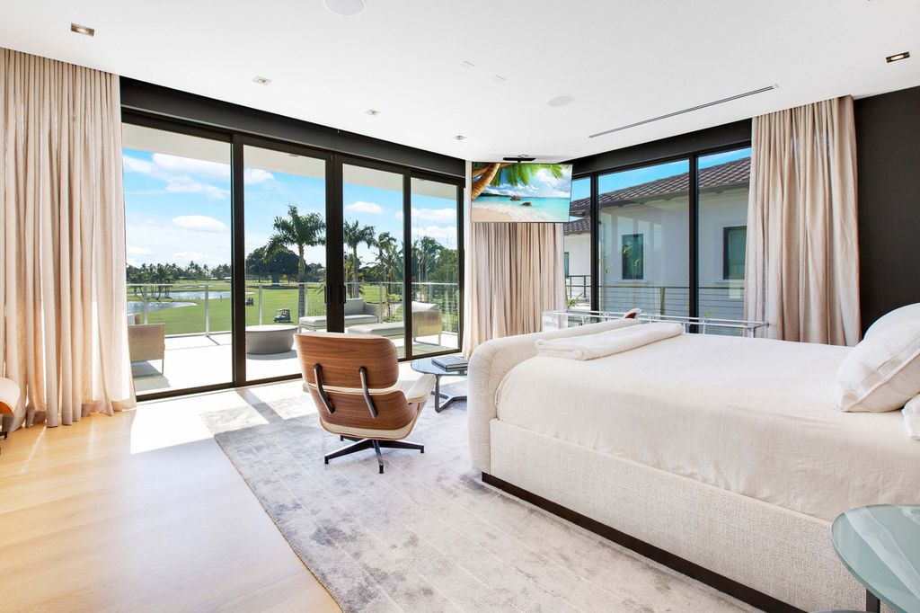 The Miami Beach Home is a new construction home located on a quiet street with direct access to the prestigious La Gorce Country Club now available for sale. This house located at 450 W 62nd St, Miami Beach, Florida