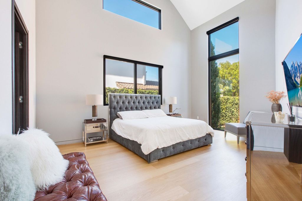 The Miami Beach Home is a new construction home located on a quiet street with direct access to the prestigious La Gorce Country Club now available for sale. This house located at 450 W 62nd St, Miami Beach, Florida