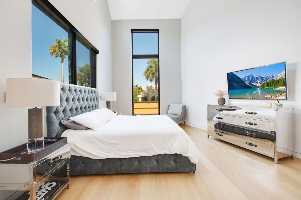 The Miami Beach Home is a new construction home located on a quiet street with direct access to the prestigious La Gorce Country Club now available for sale. This house located at 450 W 62nd St, Miami Beach, Florida