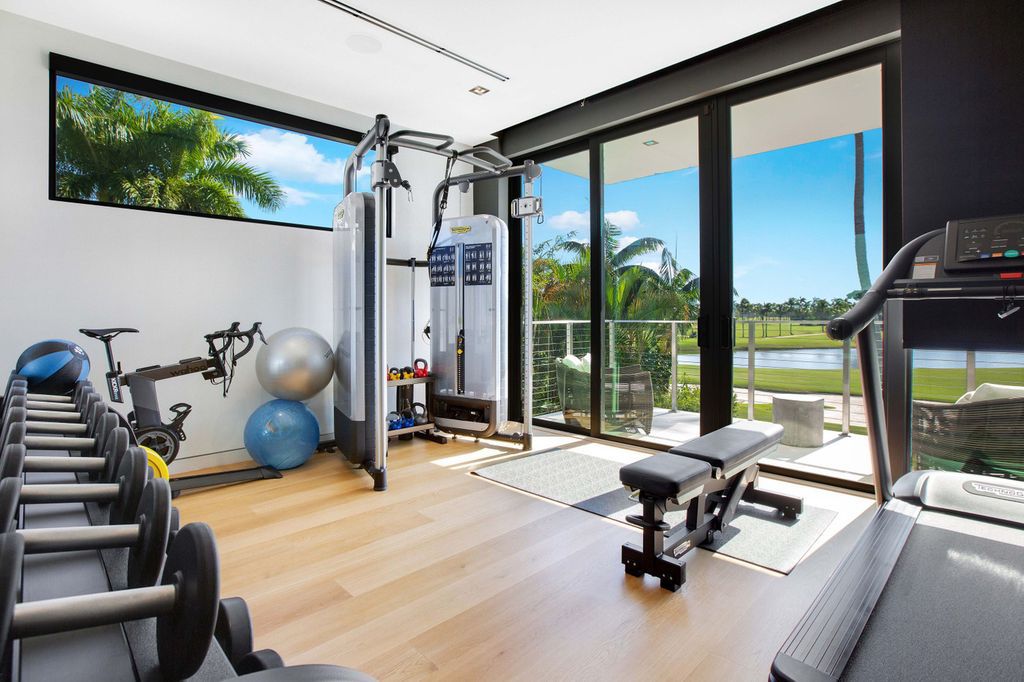 The Miami Beach Home is a new construction home located on a quiet street with direct access to the prestigious La Gorce Country Club now available for sale. This house located at 450 W 62nd St, Miami Beach, Florida