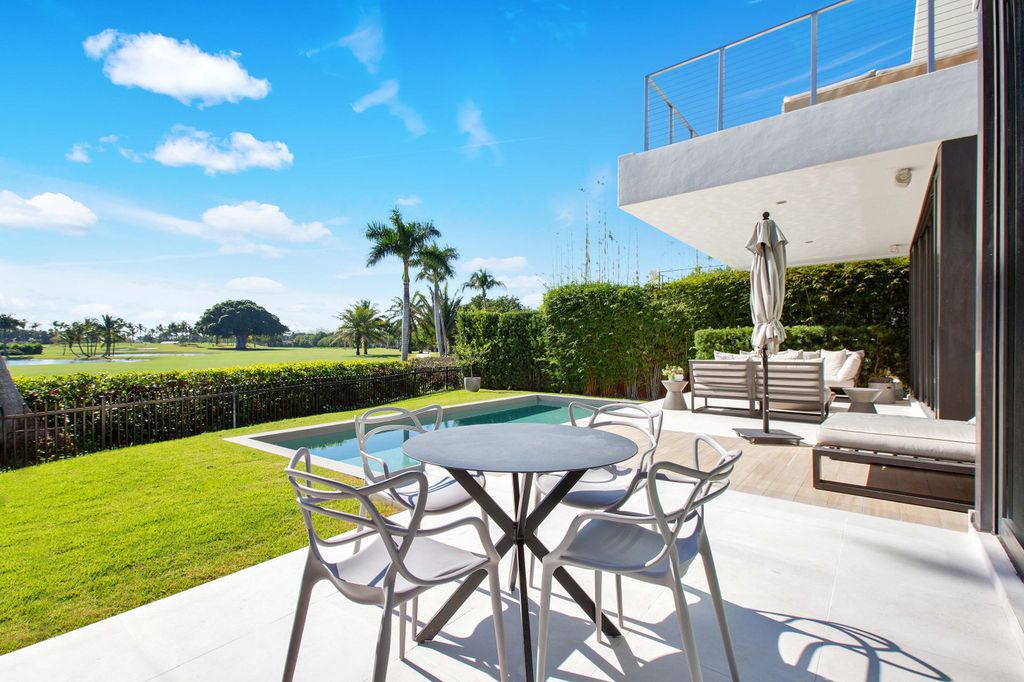 The Miami Beach Home is a new construction home located on a quiet street with direct access to the prestigious La Gorce Country Club now available for sale. This house located at 450 W 62nd St, Miami Beach, Florida