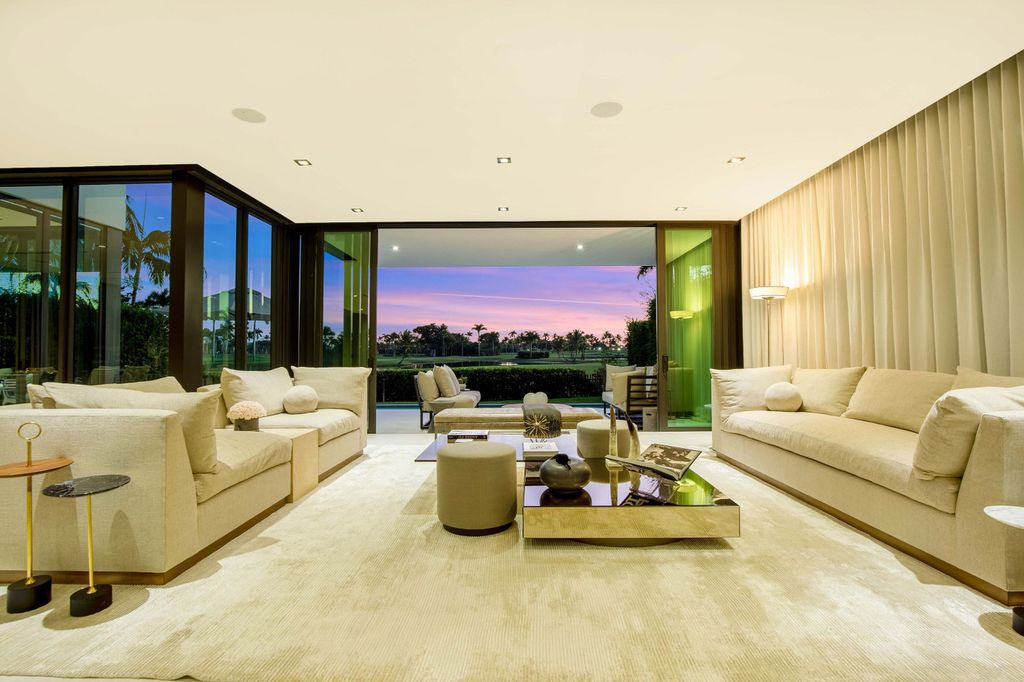 The Miami Beach Home is a new construction home located on a quiet street with direct access to the prestigious La Gorce Country Club now available for sale. This house located at 450 W 62nd St, Miami Beach, Florida