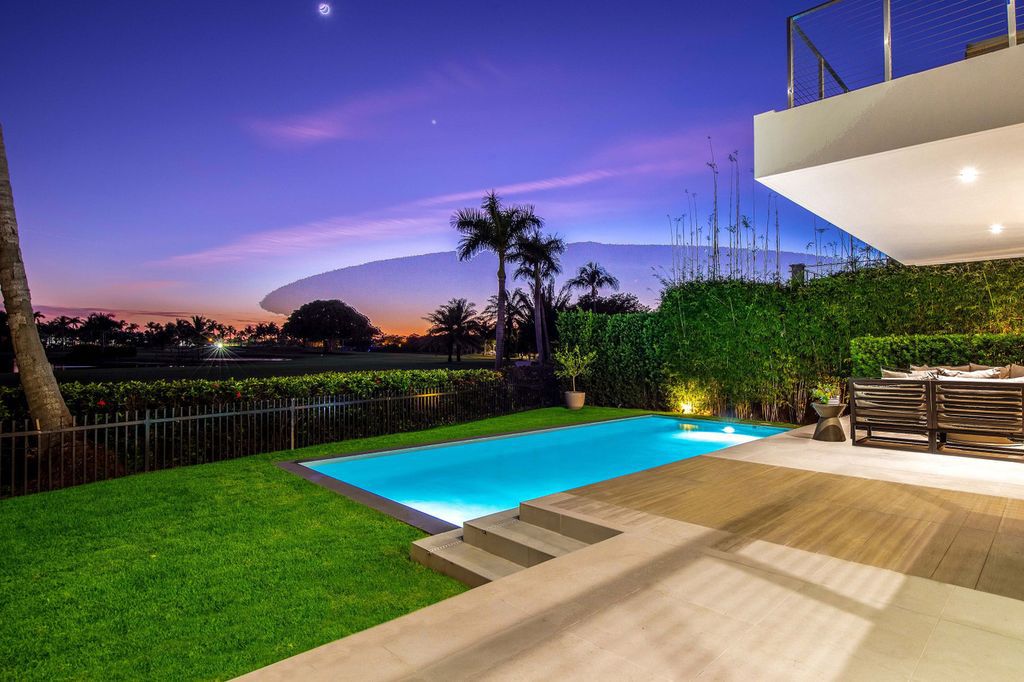 The Miami Beach Home is a new construction home located on a quiet street with direct access to the prestigious La Gorce Country Club now available for sale. This house located at 450 W 62nd St, Miami Beach, Florida