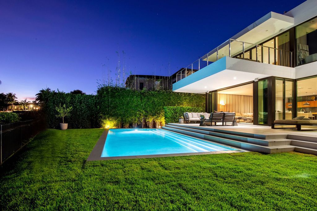 The Miami Beach Home is a new construction home located on a quiet street with direct access to the prestigious La Gorce Country Club now available for sale. This house located at 450 W 62nd St, Miami Beach, Florida