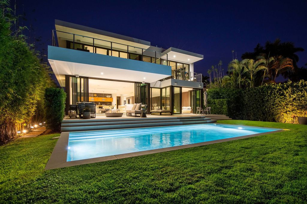 The Miami Beach Home is a new construction home located on a quiet street with direct access to the prestigious La Gorce Country Club now available for sale. This house located at 450 W 62nd St, Miami Beach, Florida