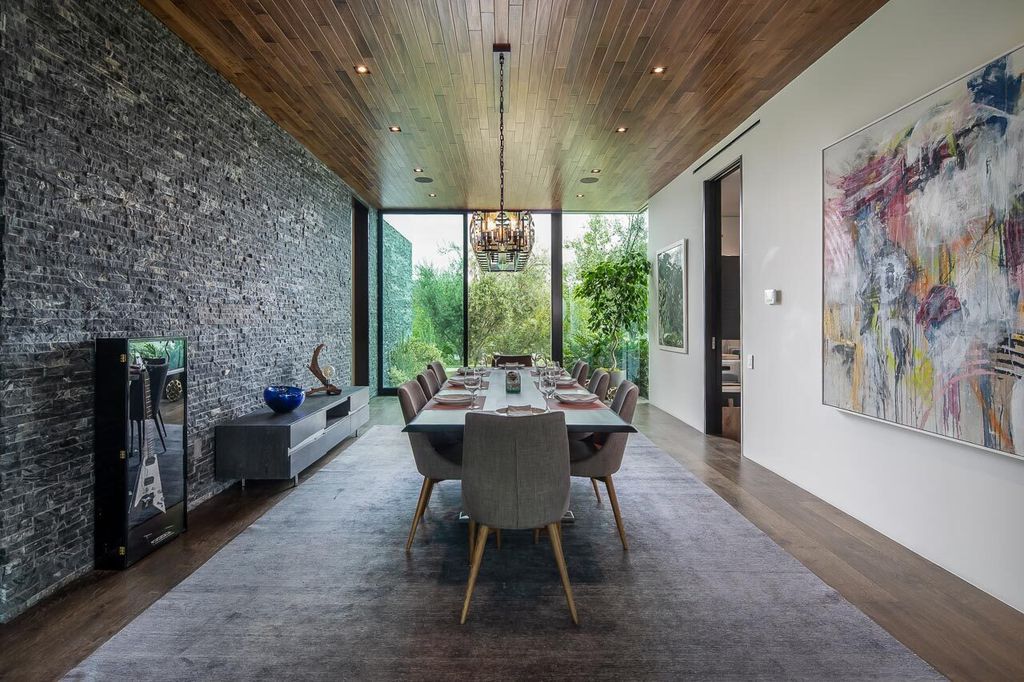 The Mansion in Beverly Hills is a one of a kind contemporary compound sits on a promontory with 270 degree views now available for sale. This home located at 3000 Benedict Canyon Dr, Beverly Hills, California