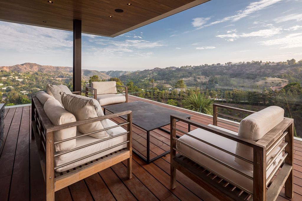 The Mansion in Beverly Hills is a one of a kind contemporary compound sits on a promontory with 270 degree views now available for sale. This home located at 3000 Benedict Canyon Dr, Beverly Hills, California