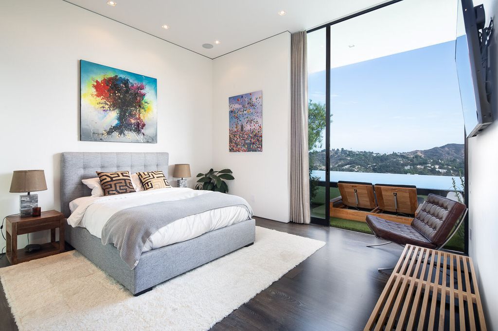 The Mansion in Beverly Hills is a one of a kind contemporary compound sits on a promontory with 270 degree views now available for sale. This home located at 3000 Benedict Canyon Dr, Beverly Hills, California