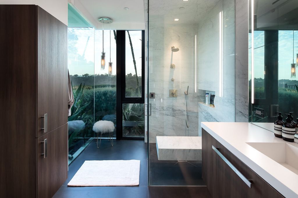 The Mansion in Beverly Hills is a one of a kind contemporary compound sits on a promontory with 270 degree views now available for sale. This home located at 3000 Benedict Canyon Dr, Beverly Hills, California