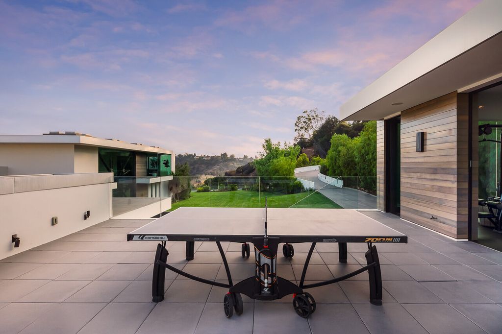 The Mansion in Beverly Hills is a one of a kind contemporary compound sits on a promontory with 270 degree views now available for sale. This home located at 3000 Benedict Canyon Dr, Beverly Hills, California