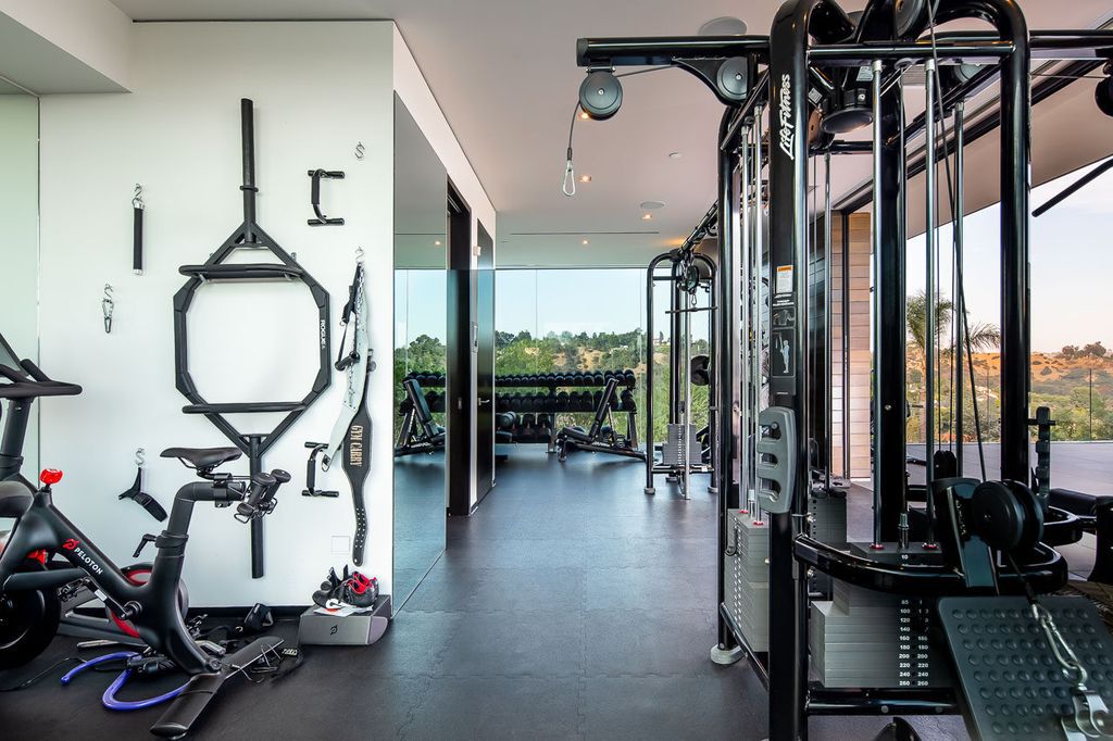 The Mansion in Beverly Hills is a one of a kind contemporary compound sits on a promontory with 270 degree views now available for sale. This home located at 3000 Benedict Canyon Dr, Beverly Hills, California