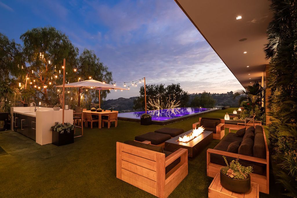 The Mansion in Beverly Hills is a one of a kind contemporary compound sits on a promontory with 270 degree views now available for sale. This home located at 3000 Benedict Canyon Dr, Beverly Hills, California