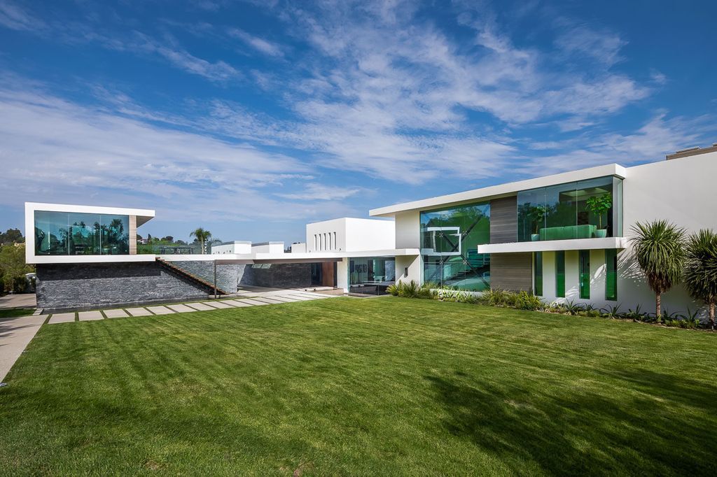 The Mansion in Beverly Hills is a one of a kind contemporary compound sits on a promontory with 270 degree views now available for sale. This home located at 3000 Benedict Canyon Dr, Beverly Hills, California