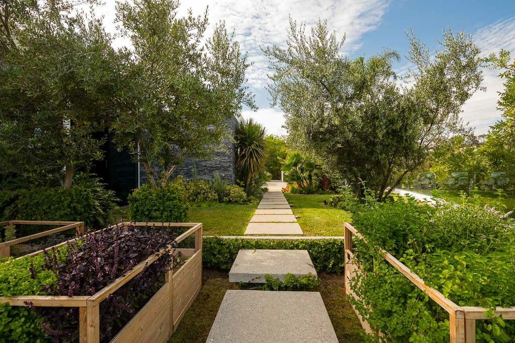 The Mansion in Beverly Hills is a one of a kind contemporary compound sits on a promontory with 270 degree views now available for sale. This home located at 3000 Benedict Canyon Dr, Beverly Hills, California