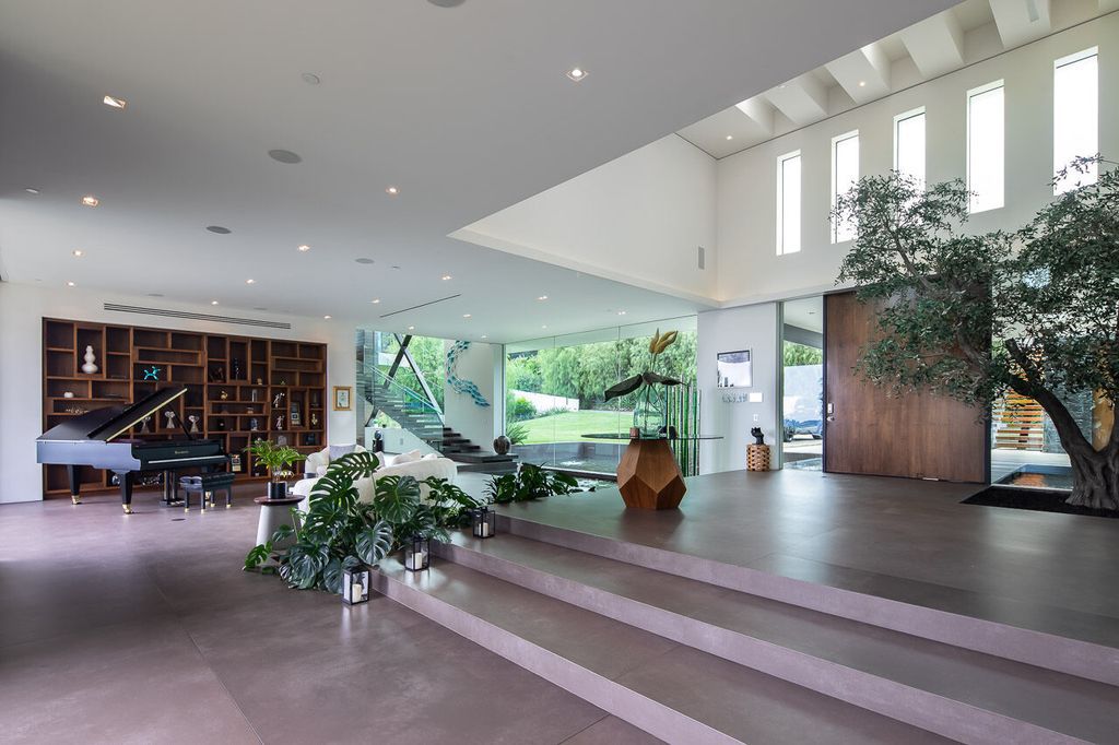 The Mansion in Beverly Hills is a one of a kind contemporary compound sits on a promontory with 270 degree views now available for sale. This home located at 3000 Benedict Canyon Dr, Beverly Hills, California