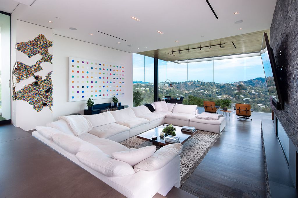 The Mansion in Beverly Hills is a one of a kind contemporary compound sits on a promontory with 270 degree views now available for sale. This home located at 3000 Benedict Canyon Dr, Beverly Hills, California