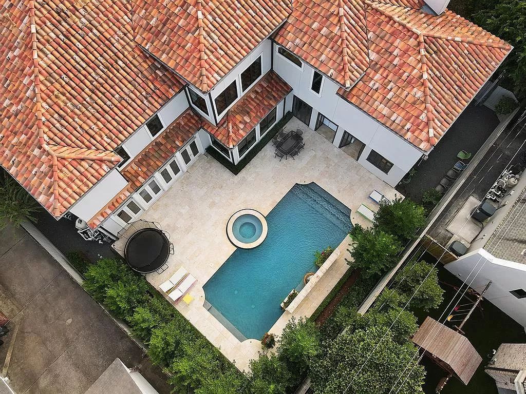 The Home in Houston is an impressive & recently constructed masterpiece by Stacey Fine Homes nestled in a beautiful & quiet part of Tanglewood now available for sale. This home located at 5804 Bayou Glen Rd, Houston, Texas