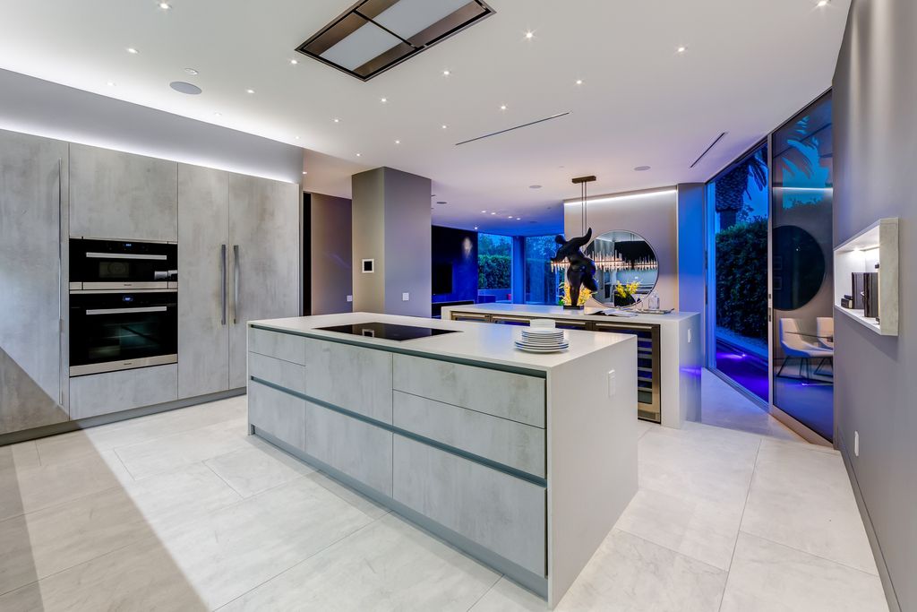 The Home in West Hollywood is a modern oasis masterfully balances cool contemporary design with lush greenery now available for sale. This house located at 417 Norwich Dr, West Hollywood, California