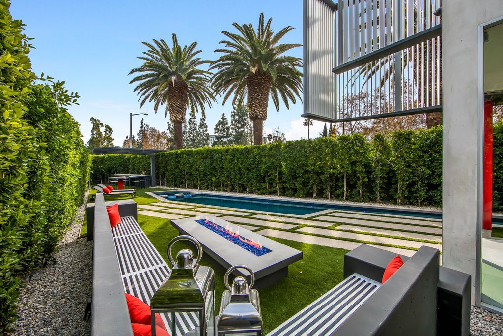 The Home in West Hollywood is a modern oasis masterfully balances cool contemporary design with lush greenery now available for sale. This house located at 417 Norwich Dr, West Hollywood, California