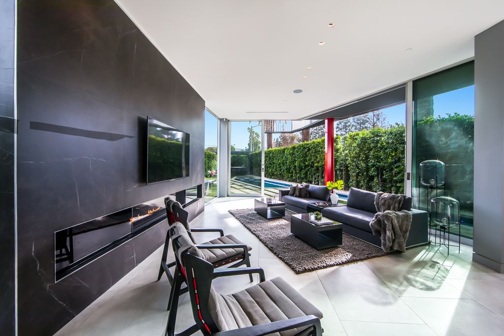 The Home in West Hollywood is a modern oasis masterfully balances cool contemporary design with lush greenery now available for sale. This house located at 417 Norwich Dr, West Hollywood, California