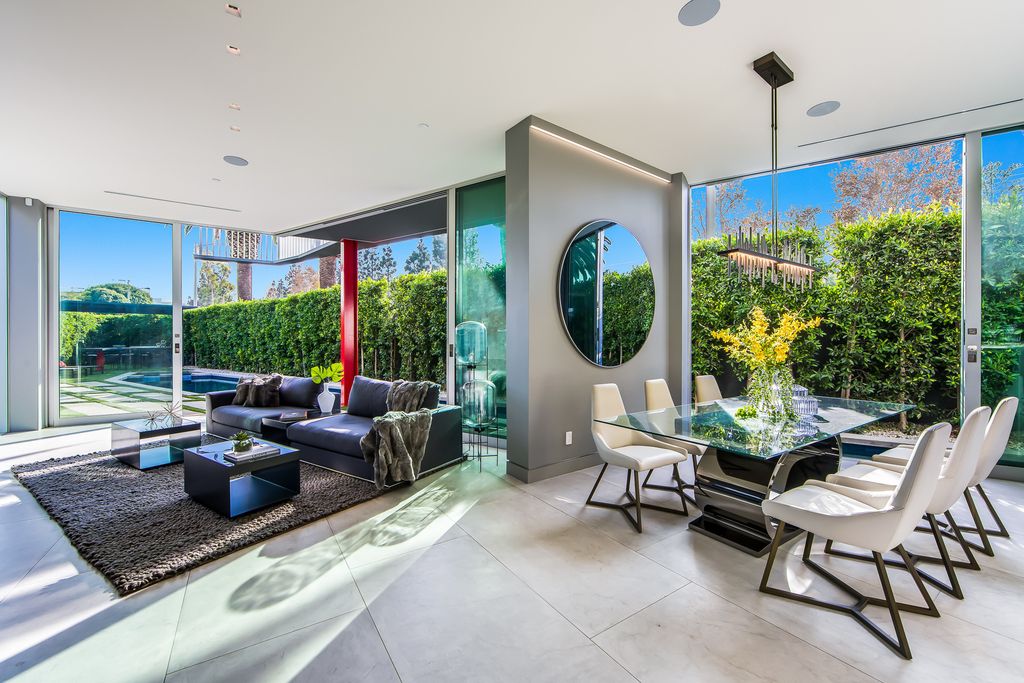 The Home in West Hollywood is a modern oasis masterfully balances cool contemporary design with lush greenery now available for sale. This house located at 417 Norwich Dr, West Hollywood, California