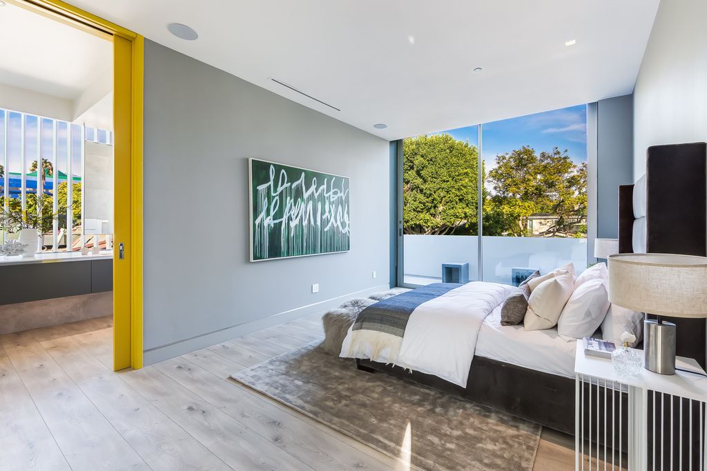 The Home in West Hollywood is a modern oasis masterfully balances cool contemporary design with lush greenery now available for sale. This house located at 417 Norwich Dr, West Hollywood, California