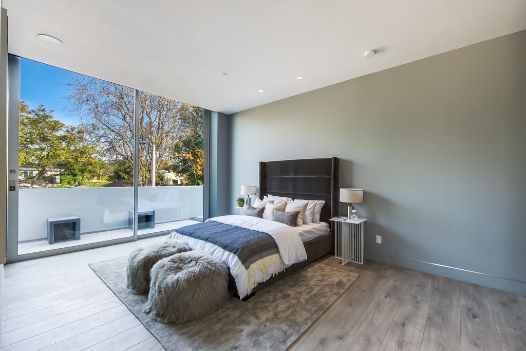 The Home in West Hollywood is a modern oasis masterfully balances cool contemporary design with lush greenery now available for sale. This house located at 417 Norwich Dr, West Hollywood, California