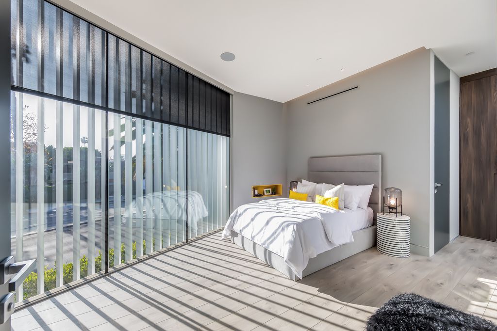 The Home in West Hollywood is a modern oasis masterfully balances cool contemporary design with lush greenery now available for sale. This house located at 417 Norwich Dr, West Hollywood, California
