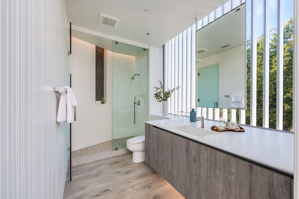 The Home in West Hollywood is a modern oasis masterfully balances cool contemporary design with lush greenery now available for sale. This house located at 417 Norwich Dr, West Hollywood, California
