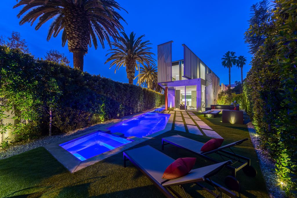 The Home in West Hollywood is a modern oasis masterfully balances cool contemporary design with lush greenery now available for sale. This house located at 417 Norwich Dr, West Hollywood, California