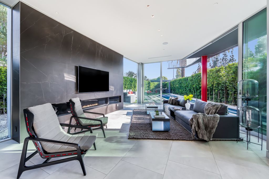 The Home in West Hollywood is a modern oasis masterfully balances cool contemporary design with lush greenery now available for sale. This house located at 417 Norwich Dr, West Hollywood, California