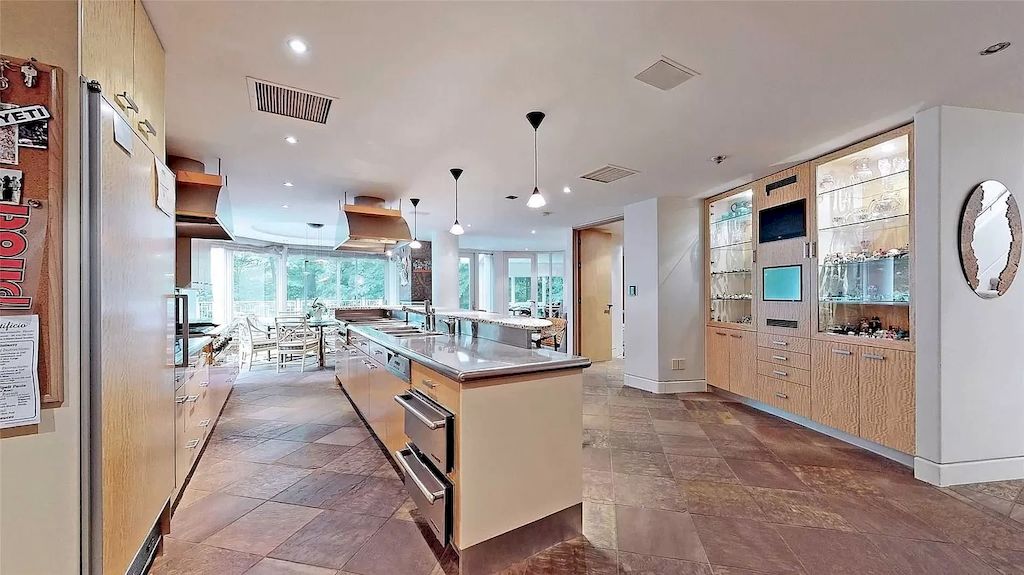The Estate in Ontario features impeccable and luxurious details now available for sale. This home located at 12 Baytree Cres, Toronto, ON M2L 2G3, Canada