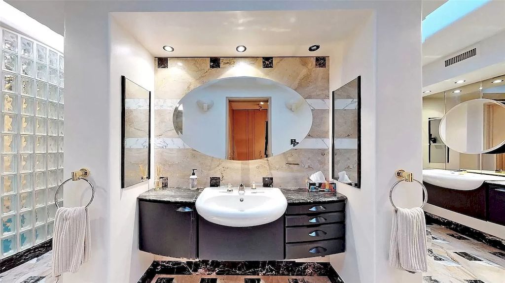 The Estate in Ontario features impeccable and luxurious details now available for sale. This home located at 12 Baytree Cres, Toronto, ON M2L 2G3, Canada