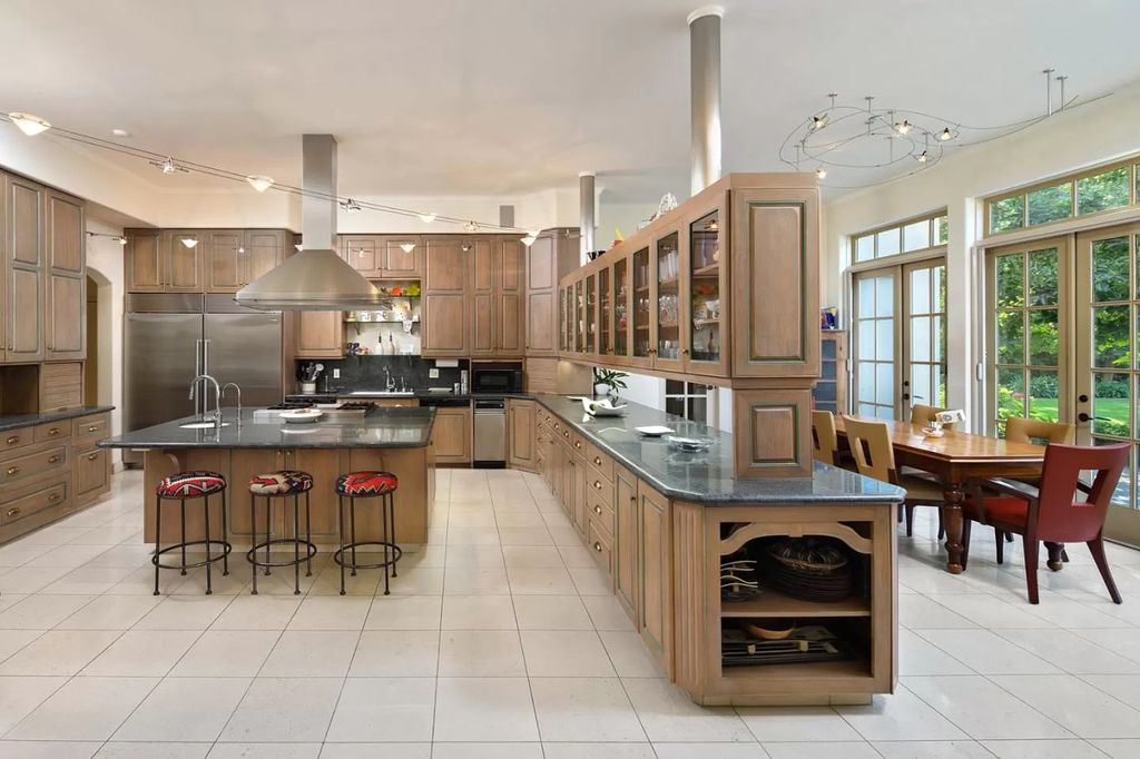 The Villa in Atherton is a European manor with contemporary touches close to Stanford University, Silicon Valley tech now available for sale. This home located at 42 Tuscaloosa Ave, Atherton, California; offering 5 bedrooms and 6 bathrooms with over 9,300 square feet of living spaces.