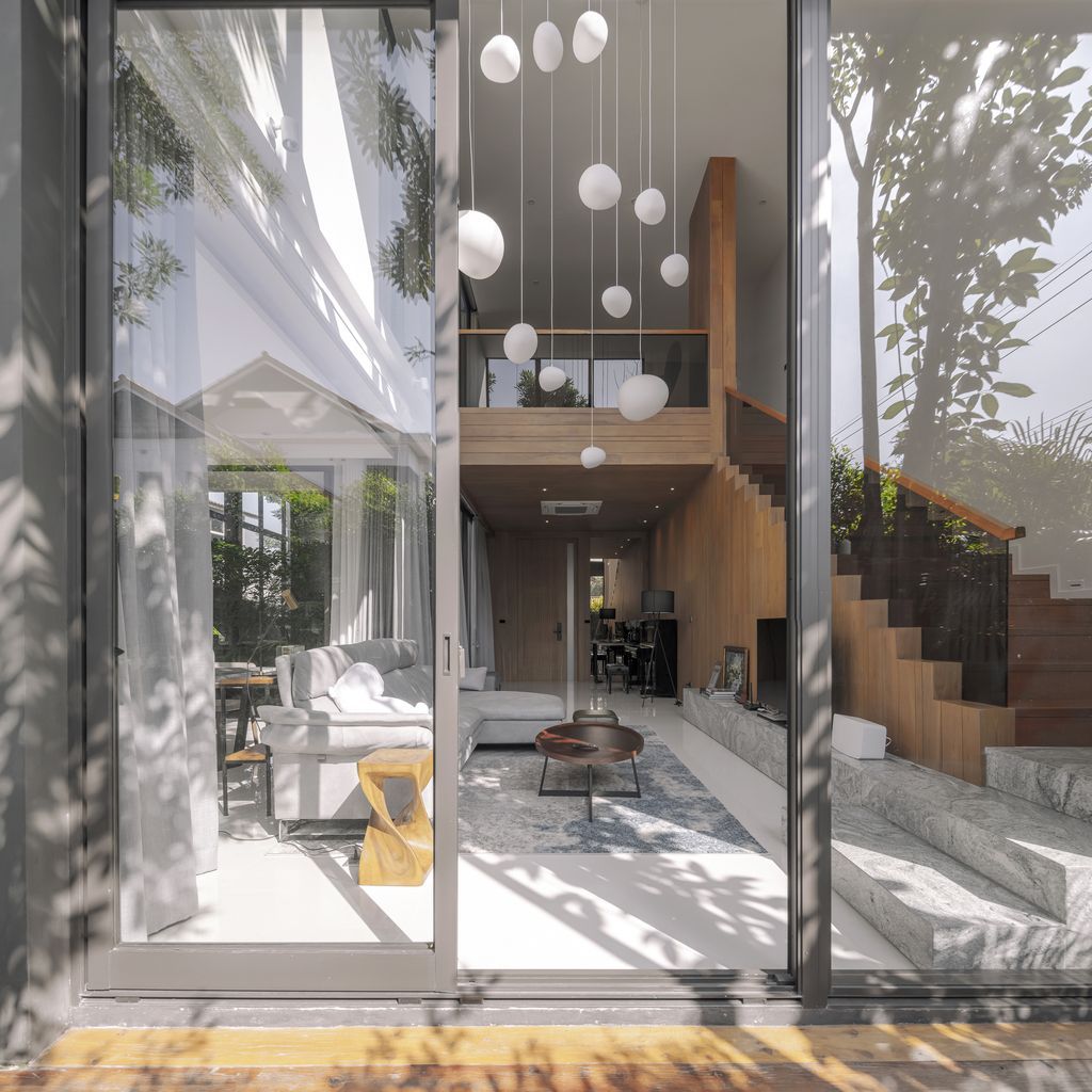 House Behide with Unique and Impressive Design by TOUCH Architect