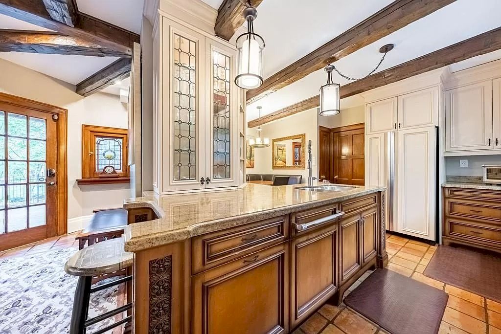 The Mississauga Castle Embraces meticulous hand crafted wood work, painted murals and exquisite stained glass windows now available for sale