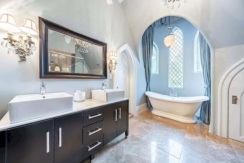 The Mississauga Castle Embraces meticulous hand crafted wood work, painted murals and exquisite stained glass windows now available for sale
