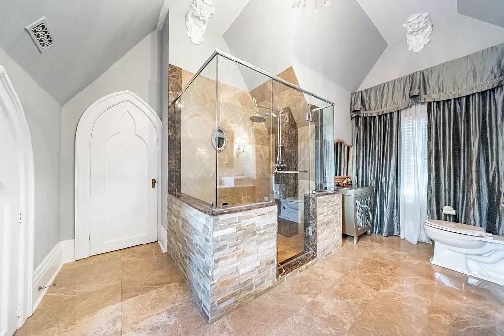 The Mississauga Castle Embraces meticulous hand crafted wood work, painted murals and exquisite stained glass windows now available for sale