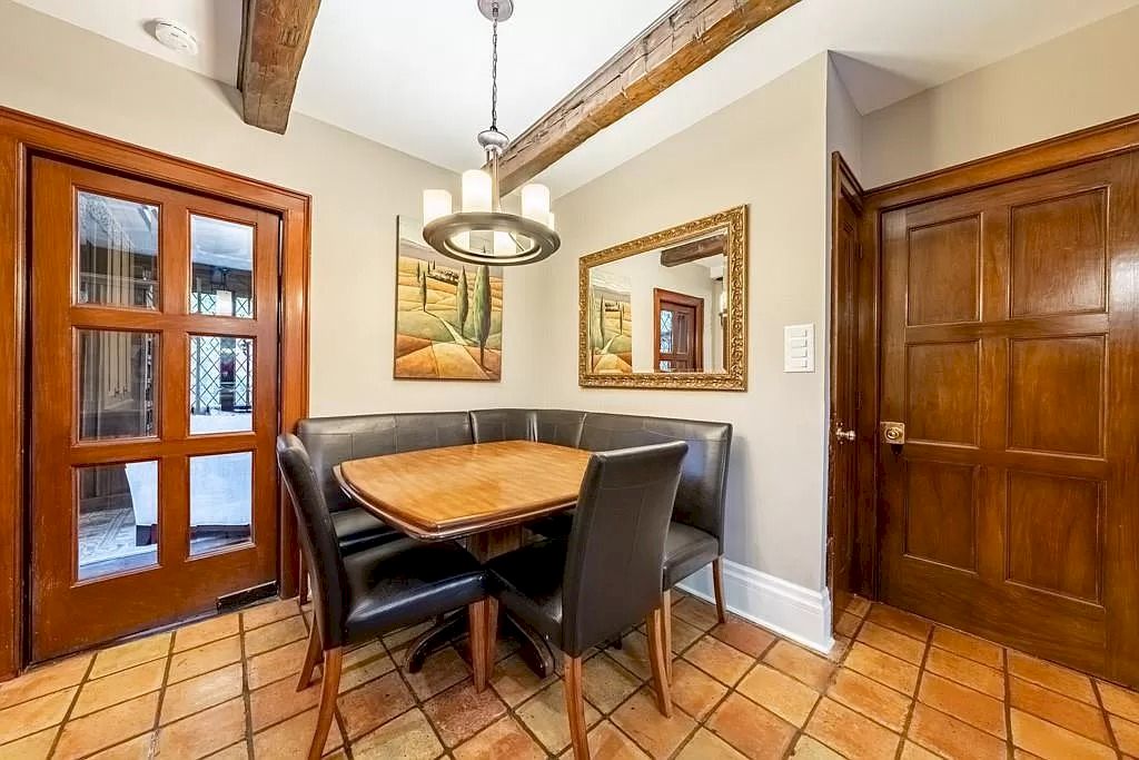 The Mississauga Castle Embraces meticulous hand crafted wood work, painted murals and exquisite stained glass windows now available for sale