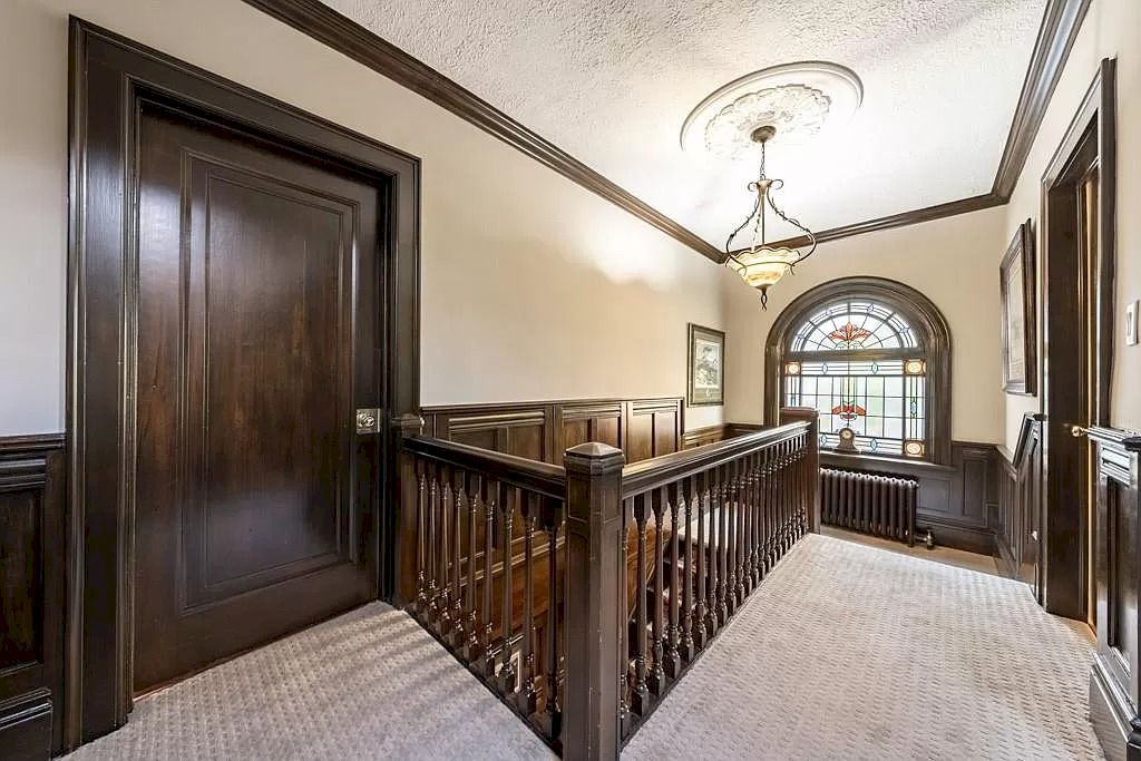 The Mississauga Castle Embraces meticulous hand crafted wood work, painted murals and exquisite stained glass windows now available for sale