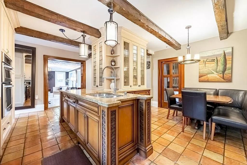 The Mississauga Castle Embraces meticulous hand crafted wood work, painted murals and exquisite stained glass windows now available for sale