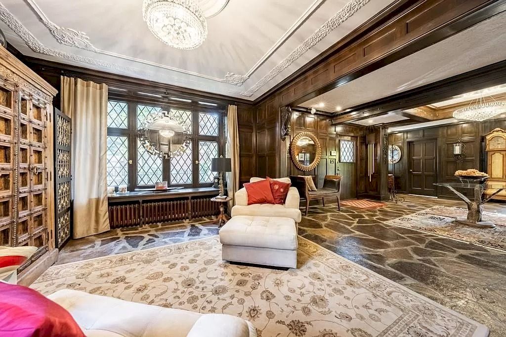 The Mississauga Castle Embraces meticulous hand crafted wood work, painted murals and exquisite stained glass windows now available for sale