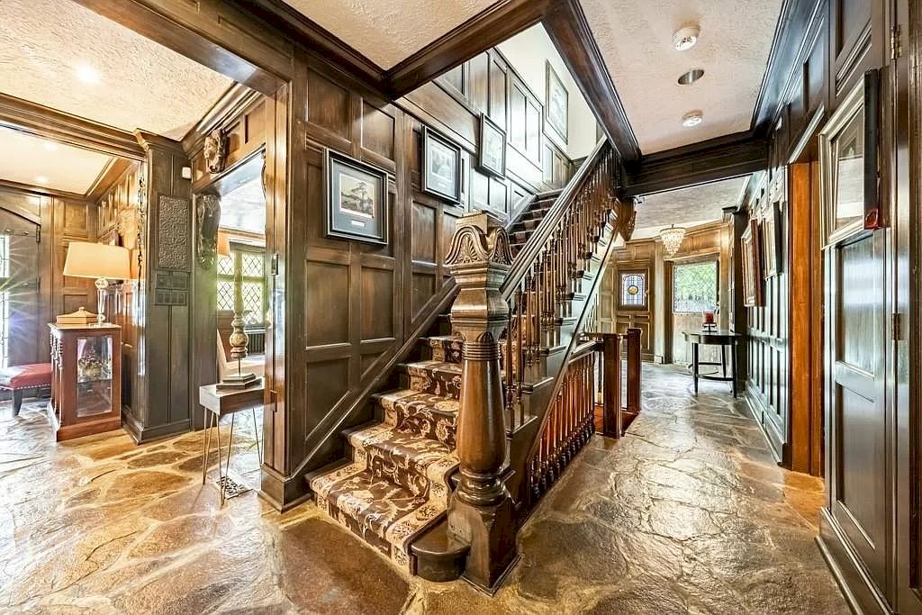 The Mississauga Castle Embraces meticulous hand crafted wood work, painted murals and exquisite stained glass windows now available for sale