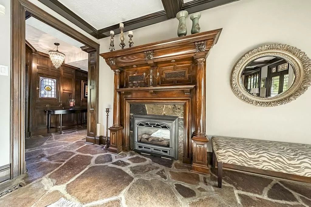 The Mississauga Castle Embraces meticulous hand crafted wood work, painted murals and exquisite stained glass windows now available for sale
