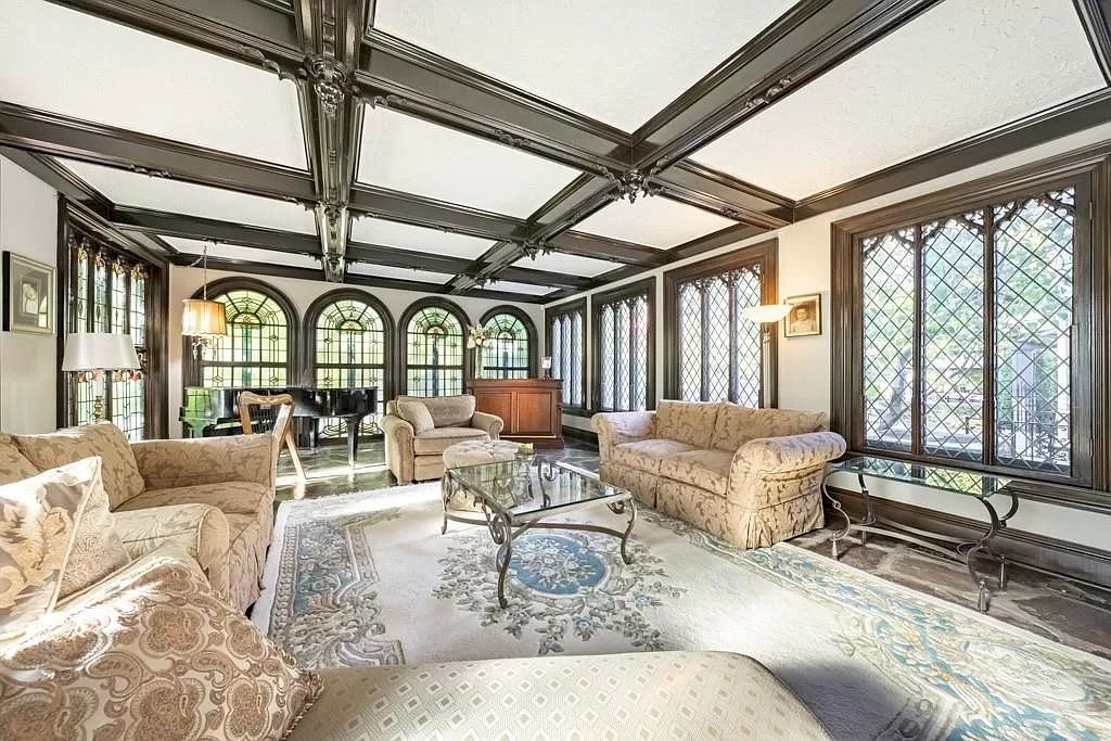 The Mississauga Castle Embraces meticulous hand crafted wood work, painted murals and exquisite stained glass windows now available for sale