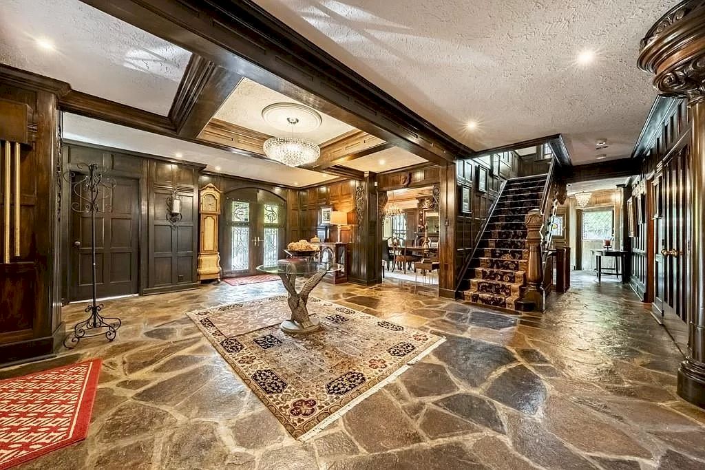 The Mississauga Castle Embraces meticulous hand crafted wood work, painted murals and exquisite stained glass windows now available for sale