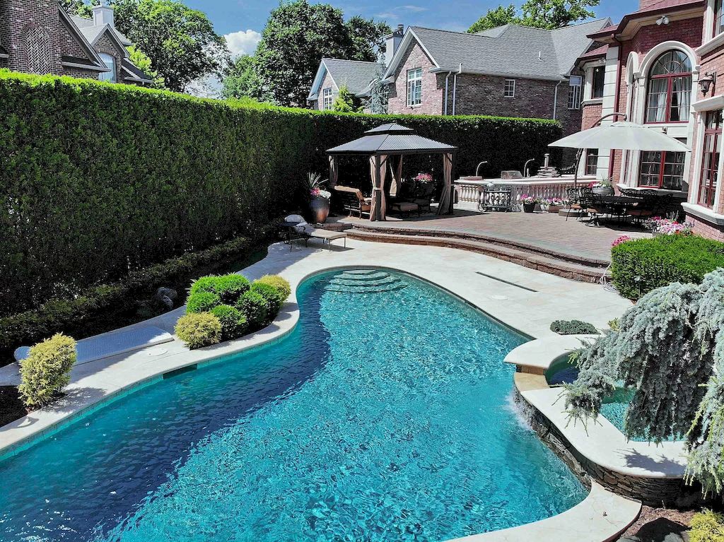 The Home in New Jersey is a luxurious home set on meticulously manicured grounds now available for sale. This home located at 2 Euclid Rd, Fort Lee, New Jersey; offering 06 bedrooms and 07 bathrooms with 6,000 square feet of living spaces. 