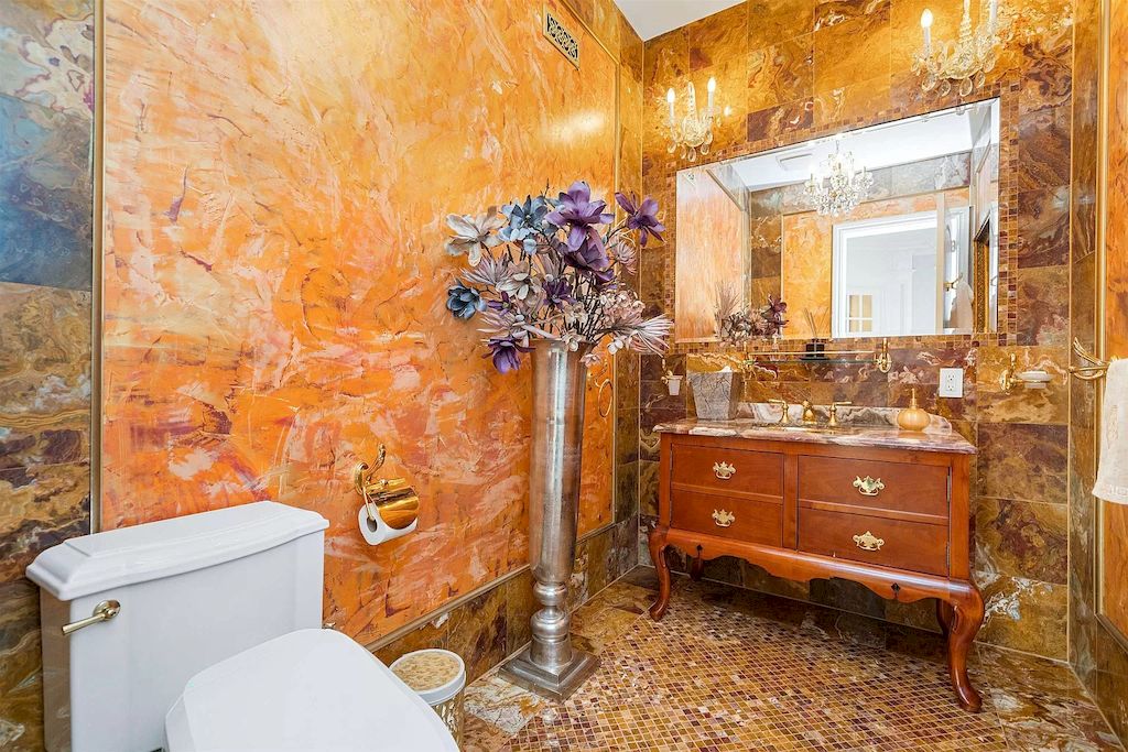 The Home in New Jersey is a luxurious home set on meticulously manicured grounds now available for sale. This home located at 2 Euclid Rd, Fort Lee, New Jersey; offering 06 bedrooms and 07 bathrooms with 6,000 square feet of living spaces. 