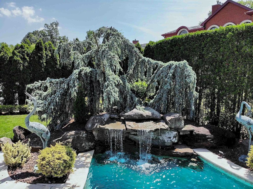 The Home in New Jersey is a luxurious home set on meticulously manicured grounds now available for sale. This home located at 2 Euclid Rd, Fort Lee, New Jersey; offering 06 bedrooms and 07 bathrooms with 6,000 square feet of living spaces. 