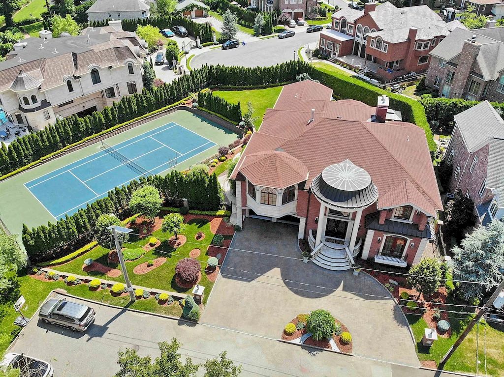 The Home in New Jersey is a luxurious home set on meticulously manicured grounds now available for sale. This home located at 2 Euclid Rd, Fort Lee, New Jersey; offering 06 bedrooms and 07 bathrooms with 6,000 square feet of living spaces. 